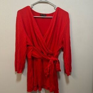 Red V-neck blouse from Lane Bryant. Size 14-16.